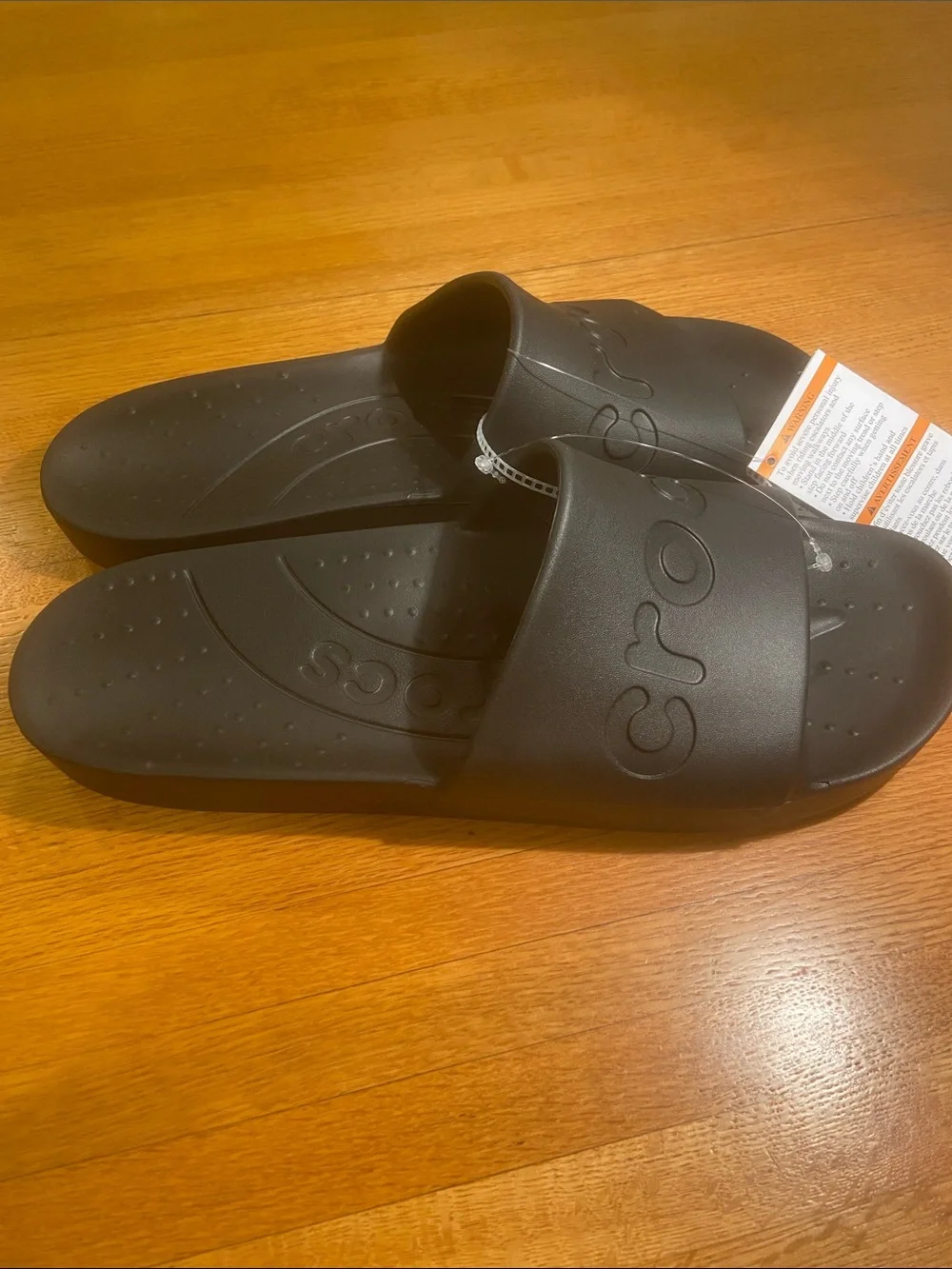 CROCS Black Slide Sandals with Embossed Logo